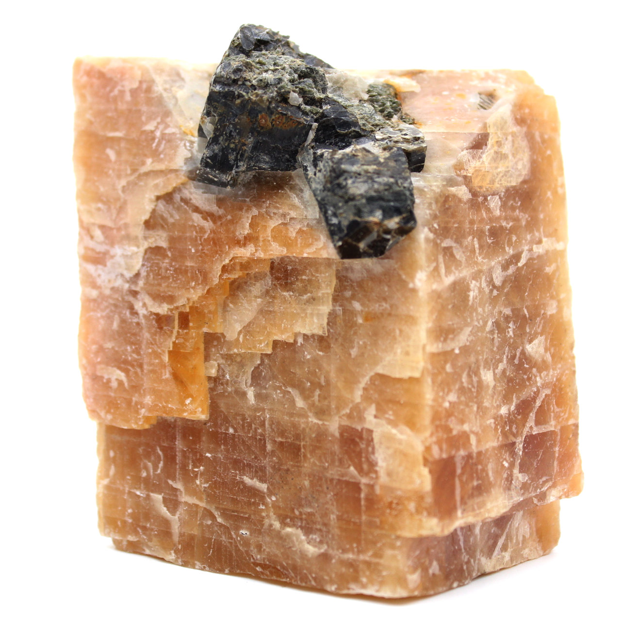 Black mica crystals on on orange calcite block