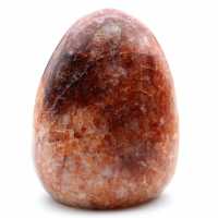 Piedra de cuarzo rojo pulido