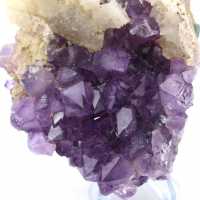 Drusa di ametista con calcite