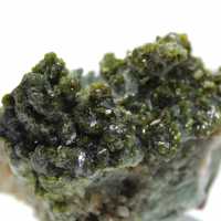 Marokkanisches Epidot auf beigem Ursprungsmatrix