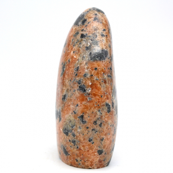 Polished orange calcite stone